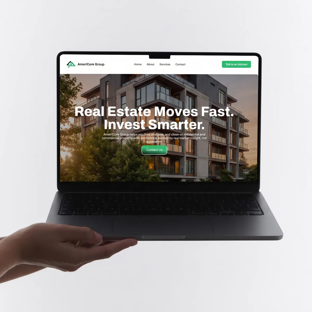 AmeriCore Group website shown on a laptop