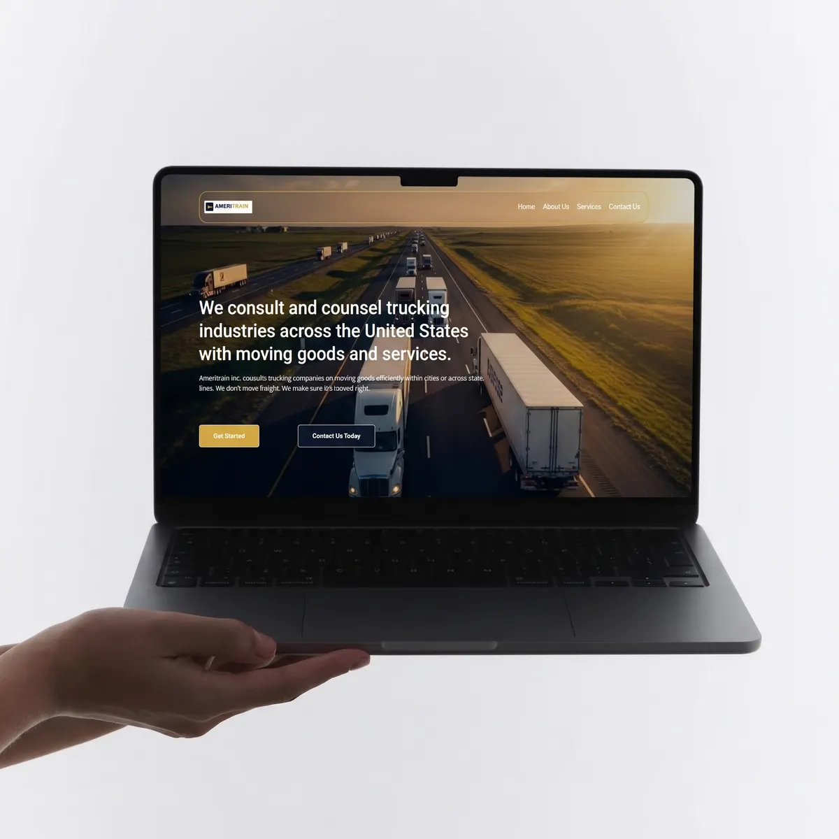 Ameritrain Inc. website shown on a laptop